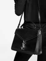 Cassandra Medium Top Handle Bag in Grain de Poudre Embossed Leather - Image 8